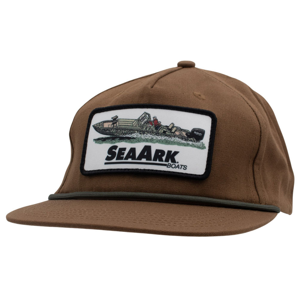A brown baseball cap with a white embroidered patch on the front that reads 'SEAARK BOATS' and shows a boat illustration. A black rope runs across the brim.