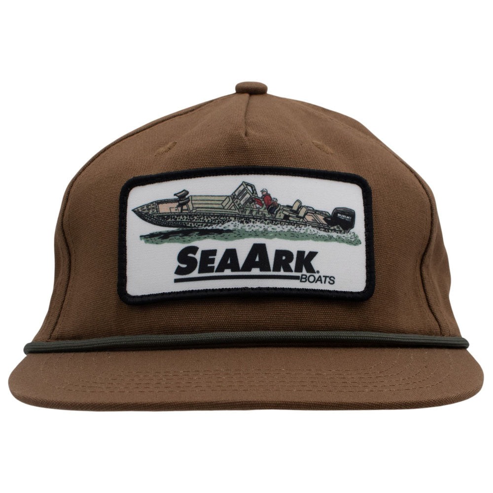 A brown flat-brim cap featuring a rectangular embroidered patch on the front with a boat illustration and the text 'SEAARK BOATS'.