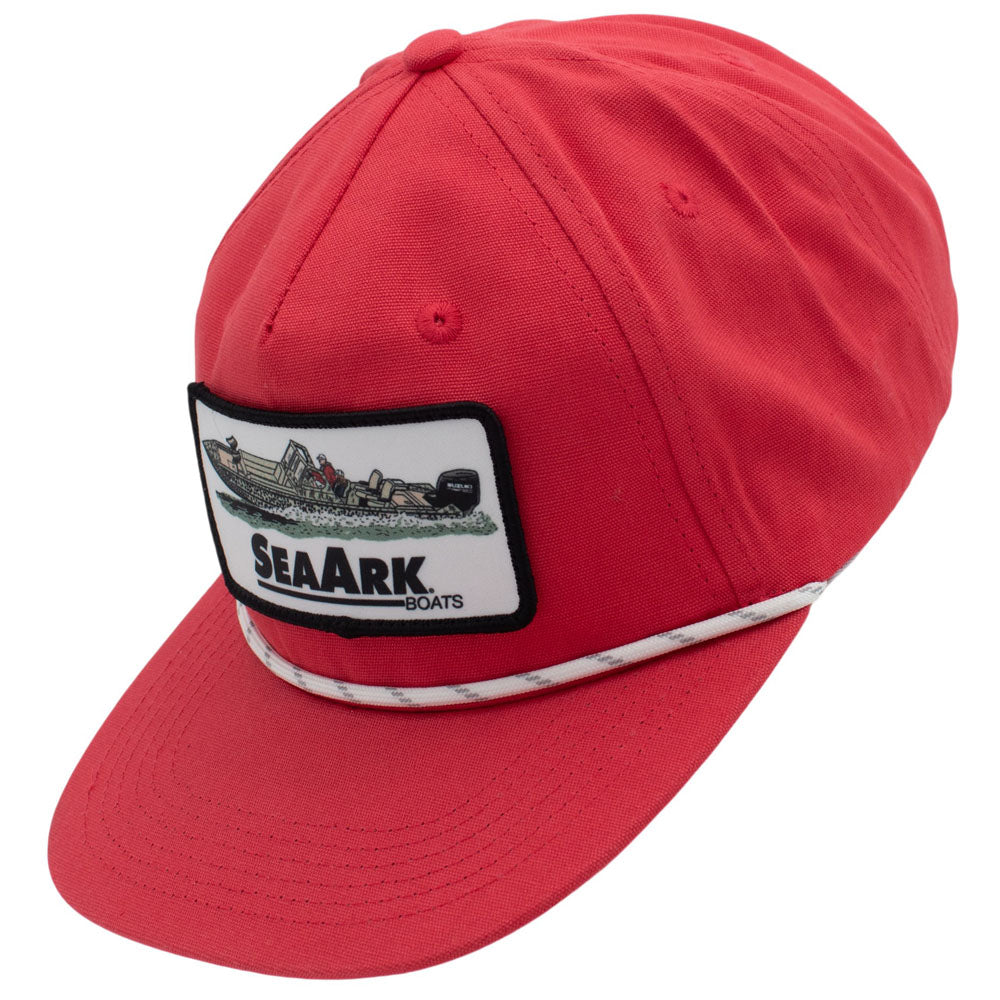 Side of a red 5-panel baseball cap with a white patch on the front displaying a boat illustration and the text 'SEAARK BOATS', finished with a white rope tied around the brim.