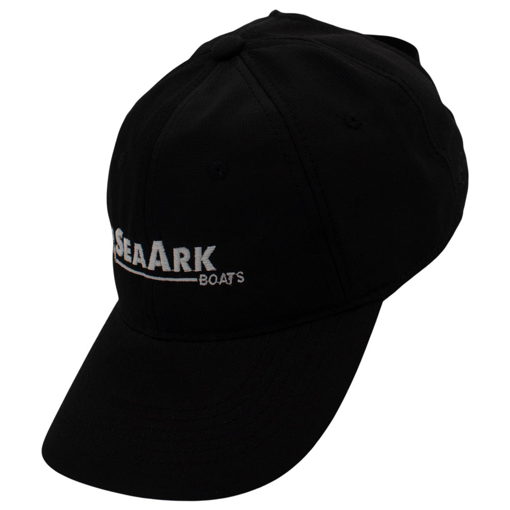 Side of a black baseball cap with a white logo embroidered on the front.