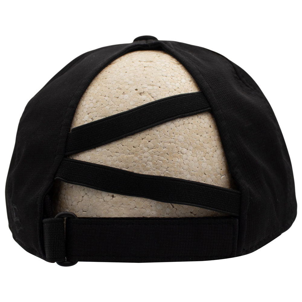 Back of a black baseball cap with a unique crisscross strap designed for ponytails, displayed on a beige foam mannequin head against a white background.