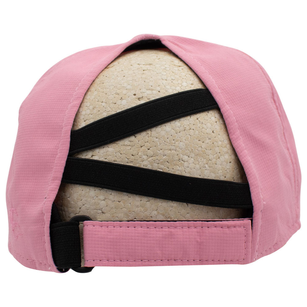 Back of a pink baseball cap with a unique crisscross strap designed for ponytails, displayed on a beige foam mannequin head against a white background.