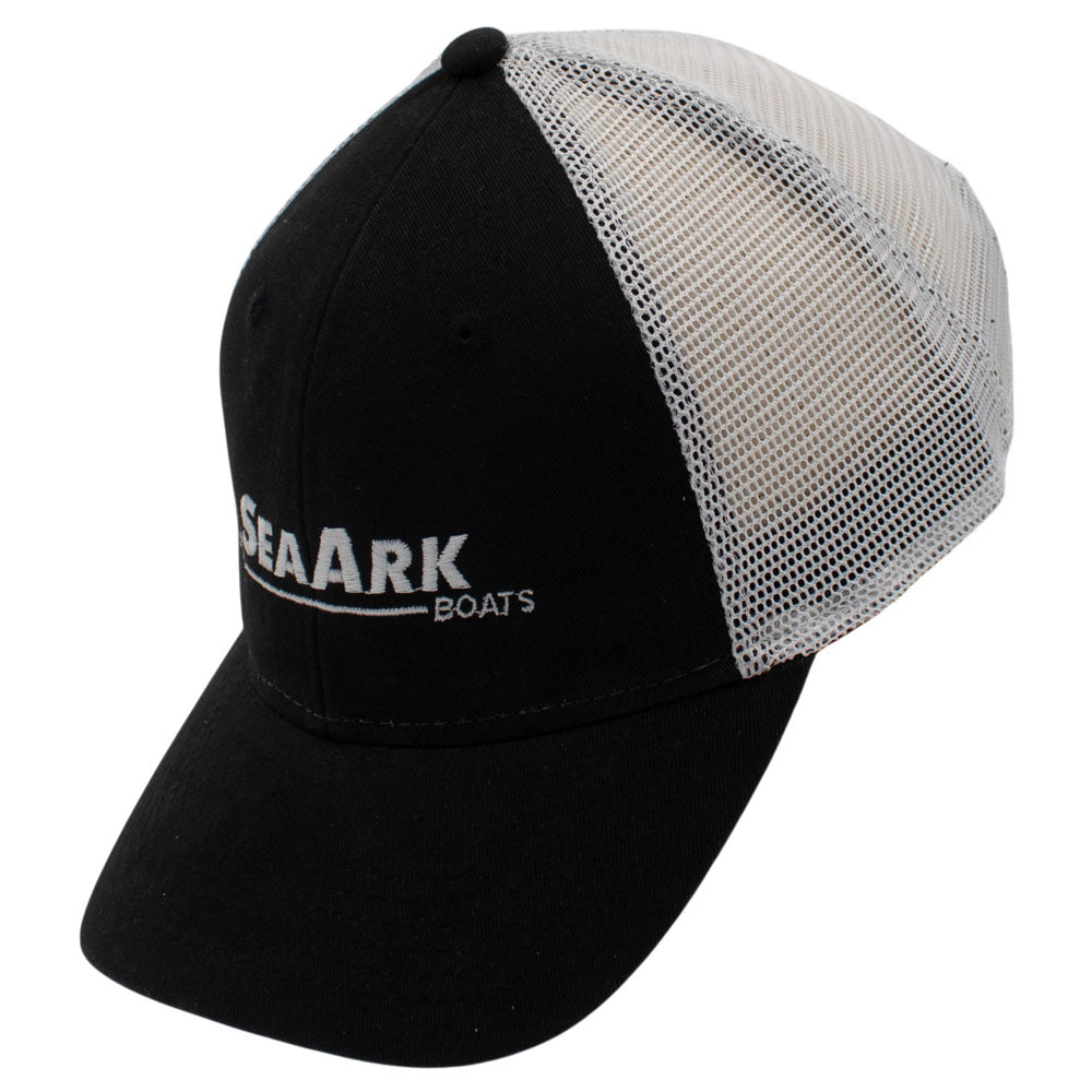 Side of a trucker-style baseball cap with a black front panel and brim, white mesh back panels, and a small embroidered logo on the front.