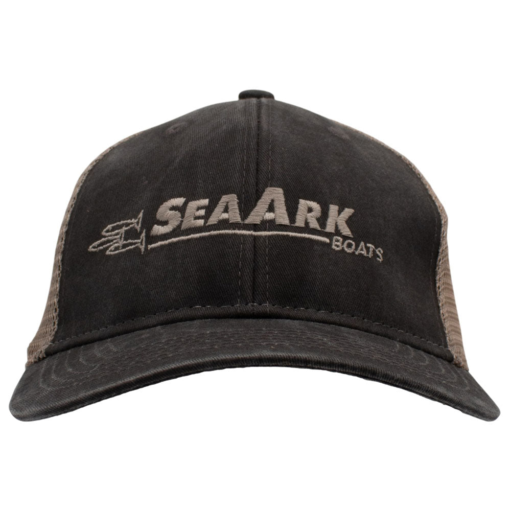 A faded trucker hat with 'SEAARK BOATS' embroidered on the front, featuring a dark grey fabric front panel and a tan mesh back.