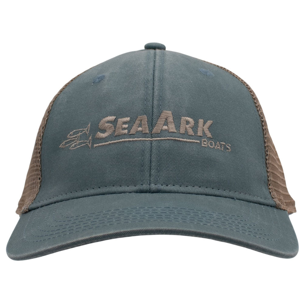 A faded trucker hat with 'SEAARK BOATS' embroidered on the front, featuring a blue-grey fabric front panel and a tan mesh back.