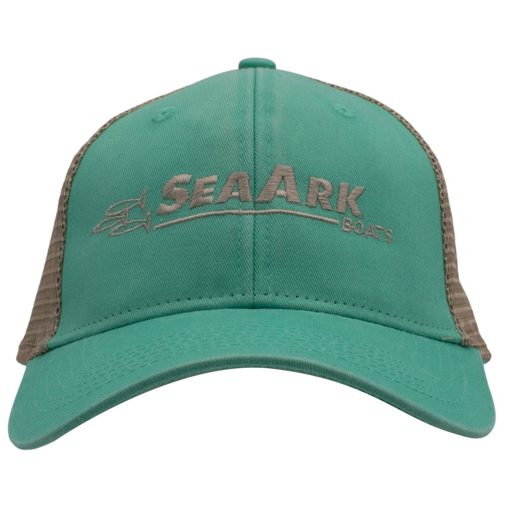A faded trucker hat with 'SEAARK BOATS' embroidered on the front, featuring a teal fabric front panel and a tan mesh back.