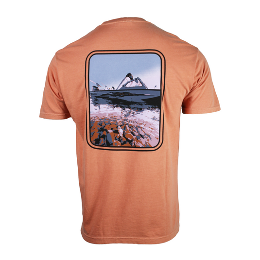 Back of a pale orange tee with a rectangular graphic of a boat on clear water and gravel.