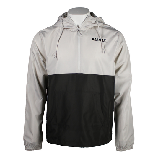 A colorblock hooded windbreaker jacket on a white mannequin torso. The jacket features a light gray upper section and sleeves, a solid black lower section, and a black 'SEA ARK' logo on the left chest.